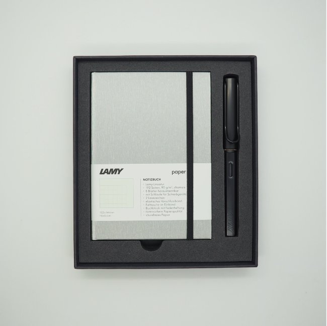 Комплект: Ручка перьевая Lamy Al-star Черный, Записная книжка, твердый переплет, А6, черный Комплект: Ручка перьевая Lamy Al-star Черный, Записная книжка, твердый переплет, А6, черный